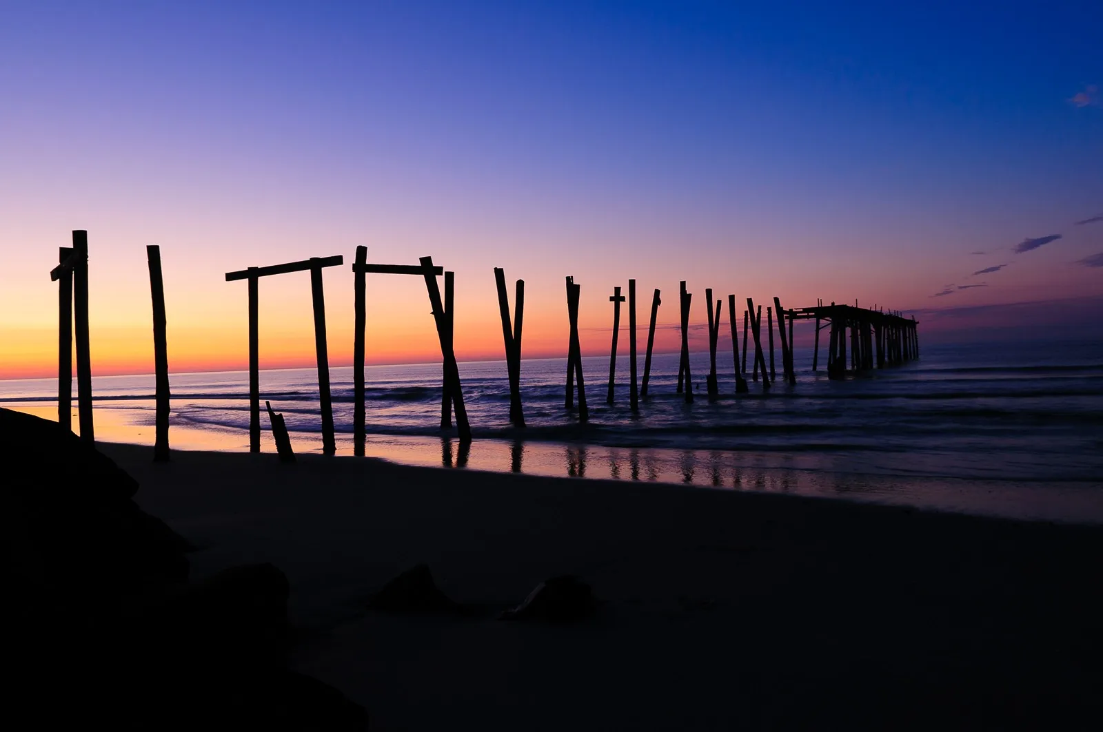 Fishing Pier at Sunrise in Ocean City New Jersey by Photographic Arts And  Design Studio